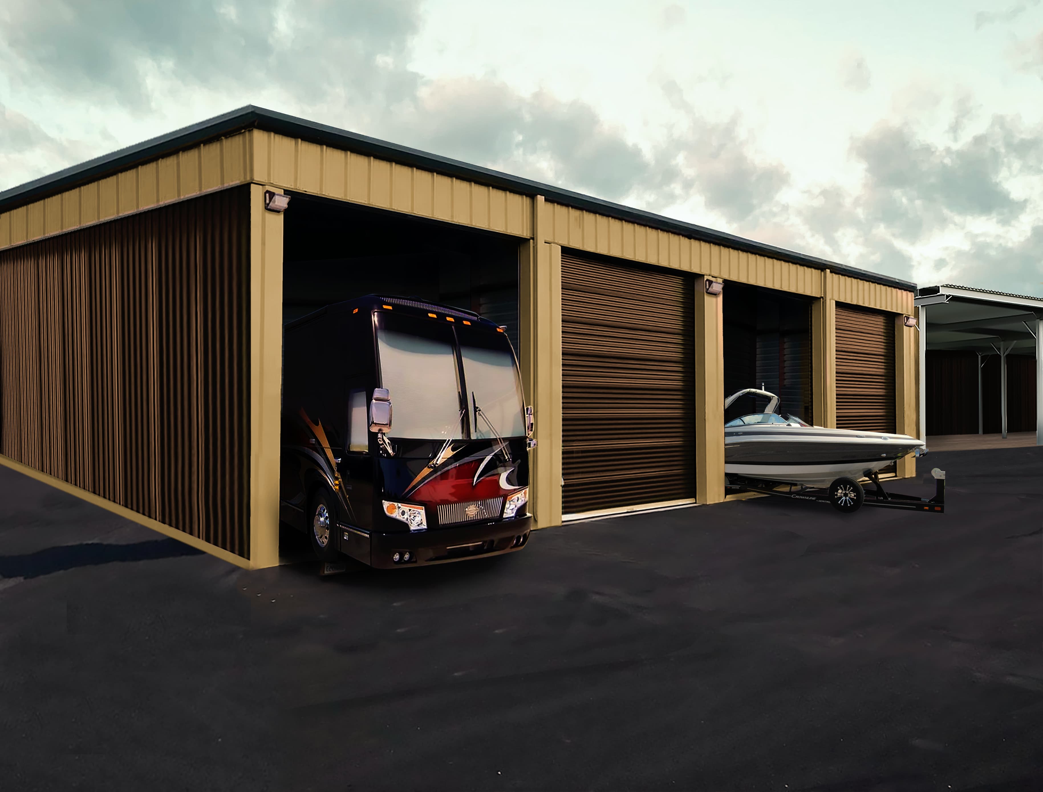 Tan metal storage building with a luxury RV and boat parked in open bays.